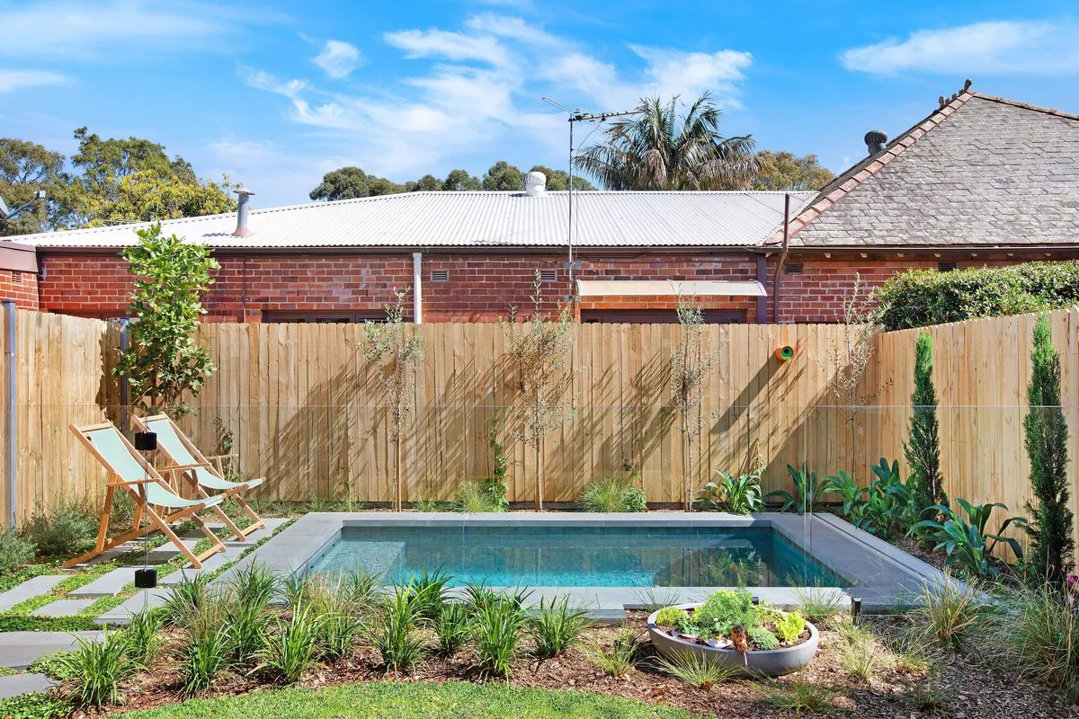 Plunge pool and landscaped garden behind an established brick home, Haberfield | Refined Group