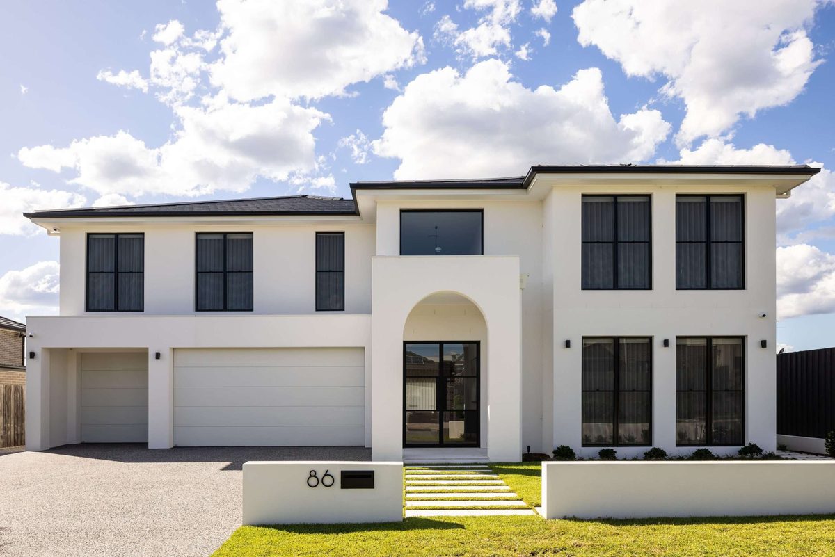 Architect designed custom home with arched entry, Kellyville, built by Refined Group