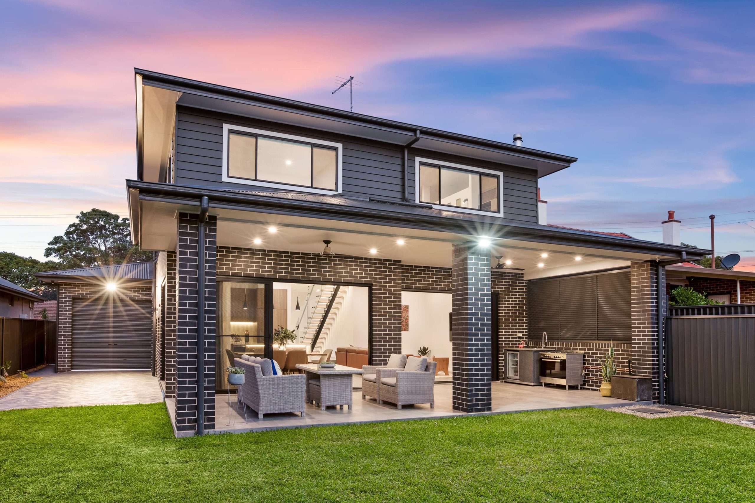 Contemporary Australian home facade at dusk, Westmead custom build by Refined Group