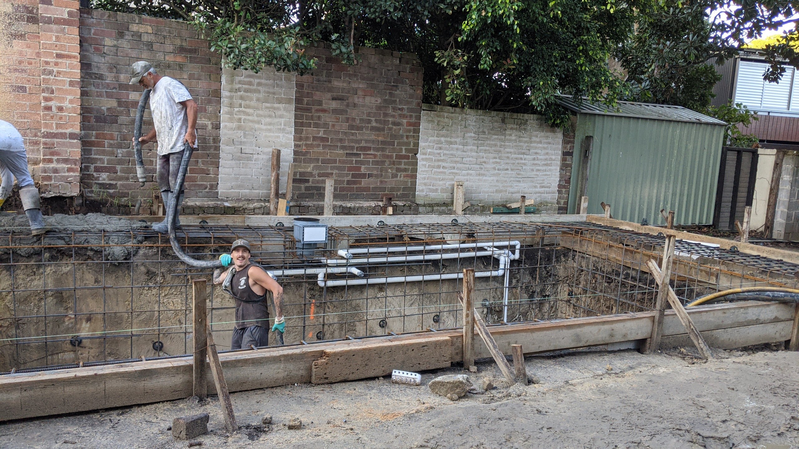 Concrete pour: the Refined Group team pumping the Balmain pool shell