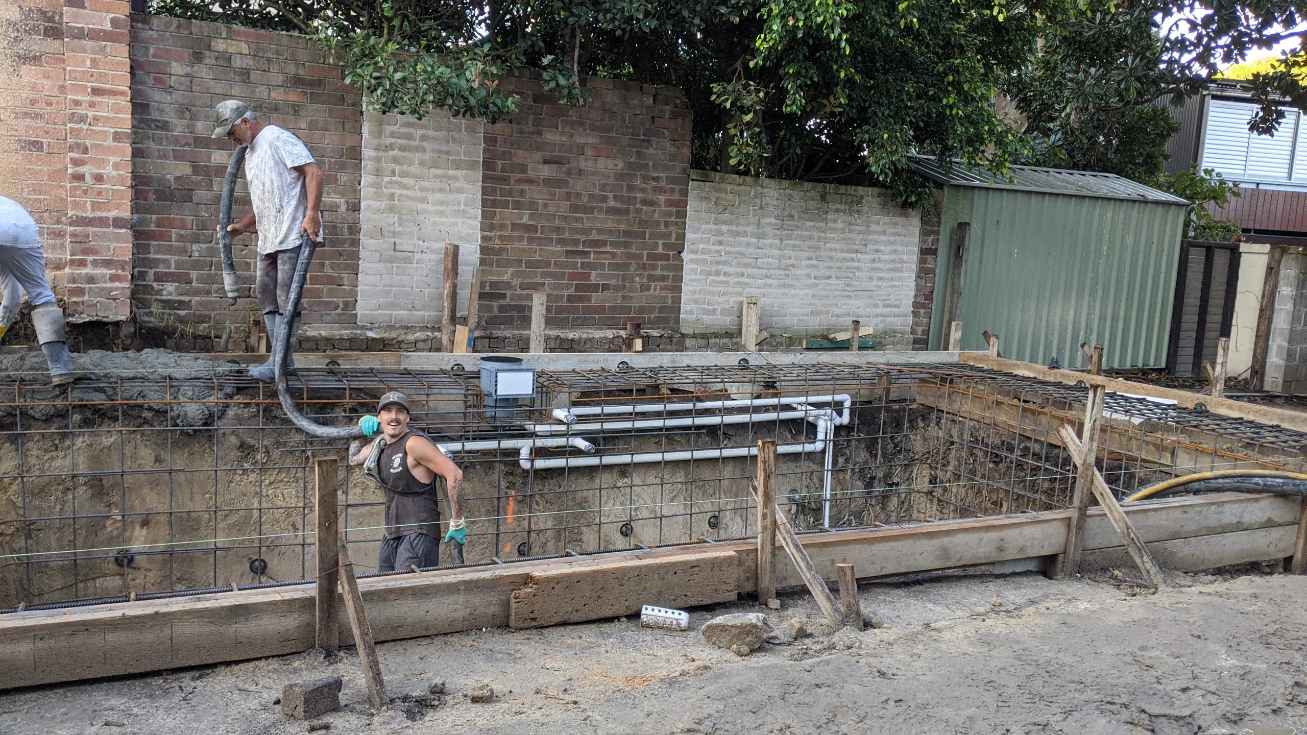 Concrete pour: the Refined Group team pumping the Balmain pool shell