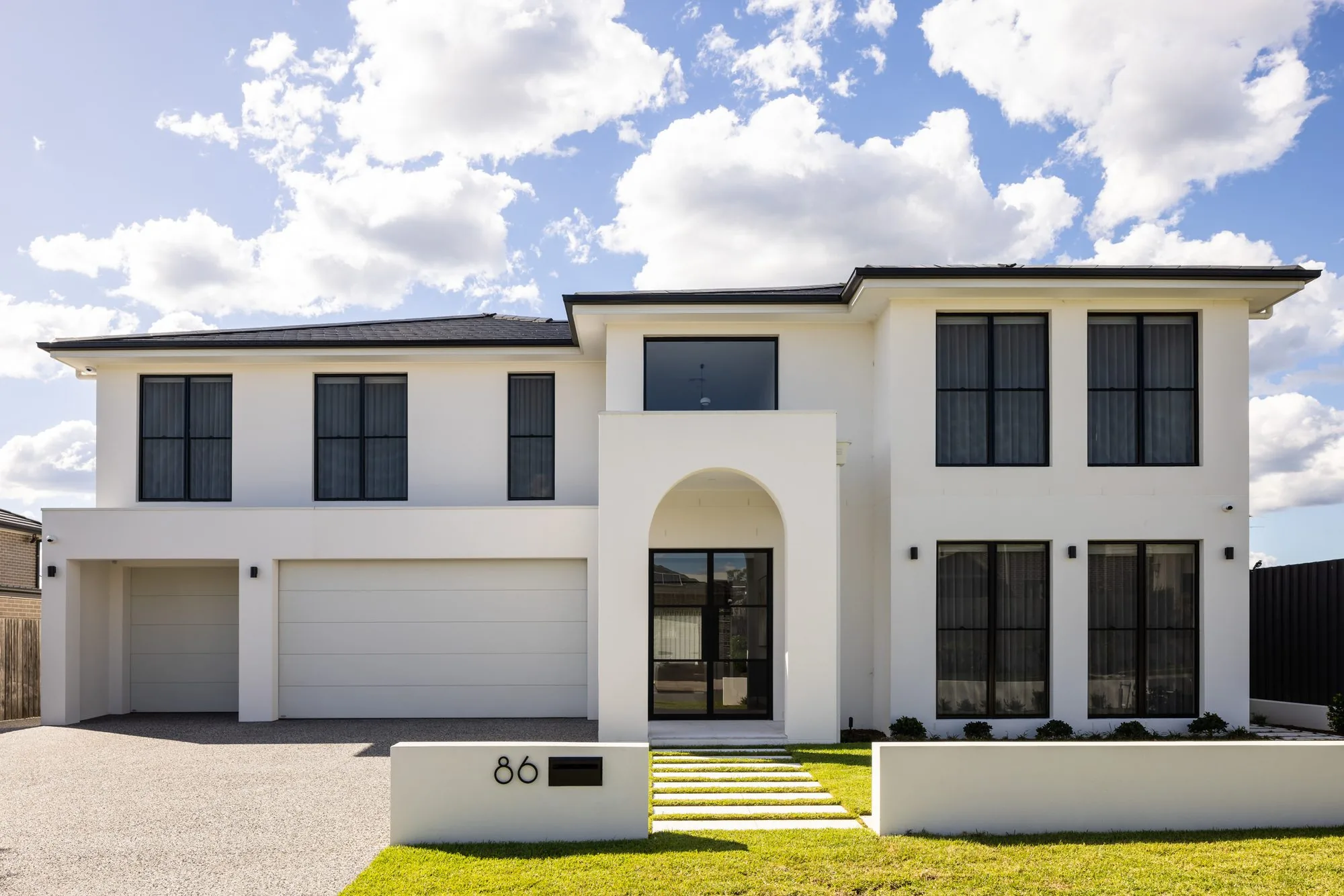 Custom home with arched entry in Kellyville, built by Refined Group