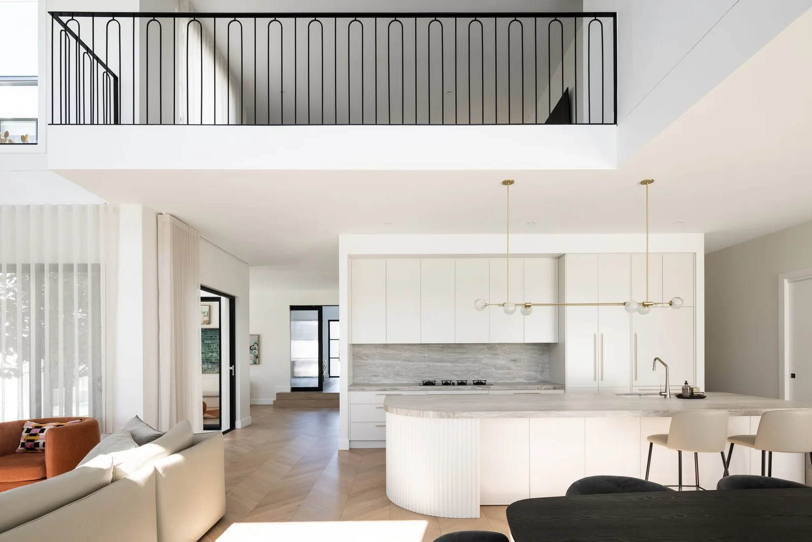 Double height living space in a Refined Group custom home