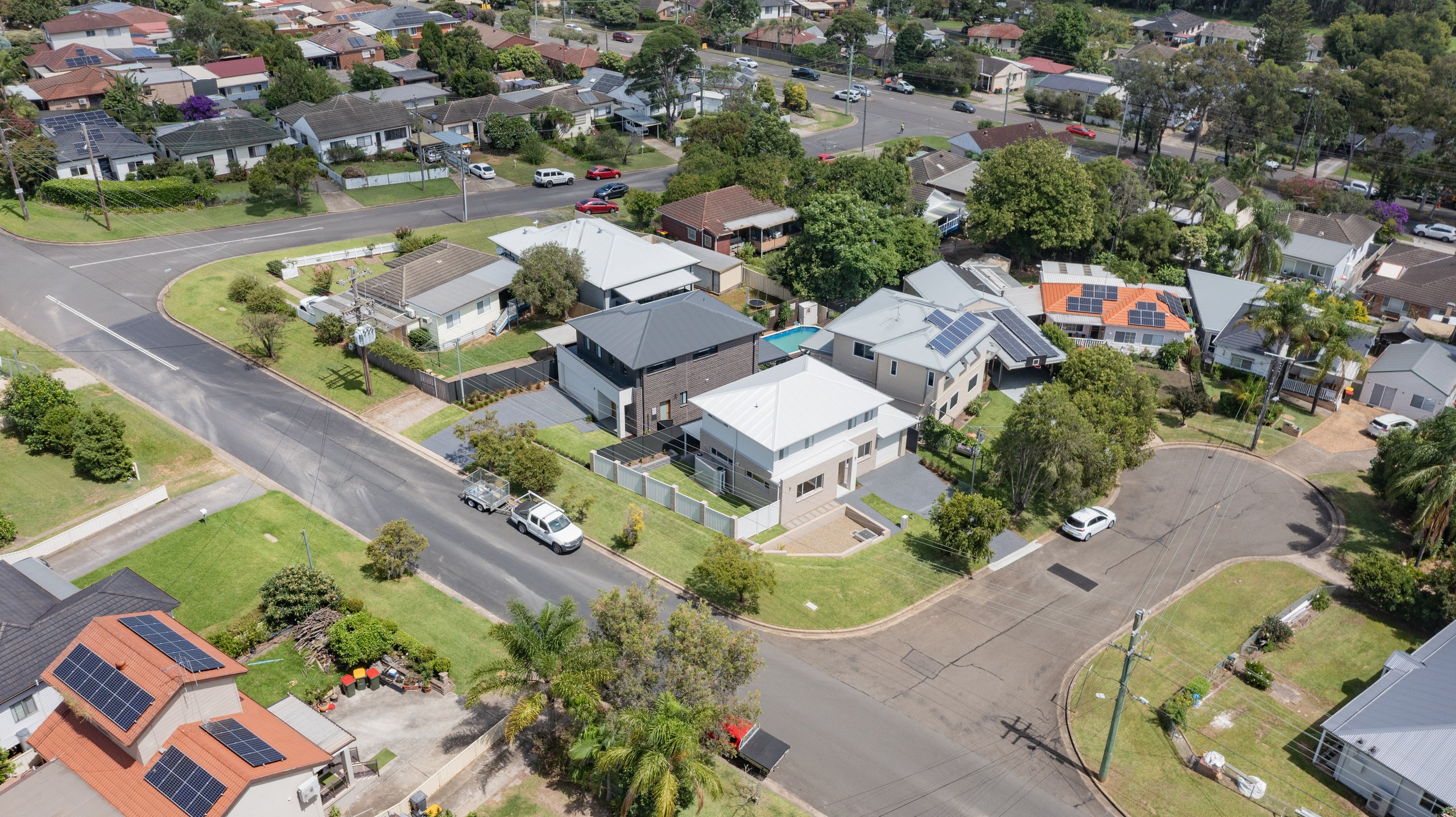 Aerial view of the subdivided block and both new homes in the Seven Hills streetscape