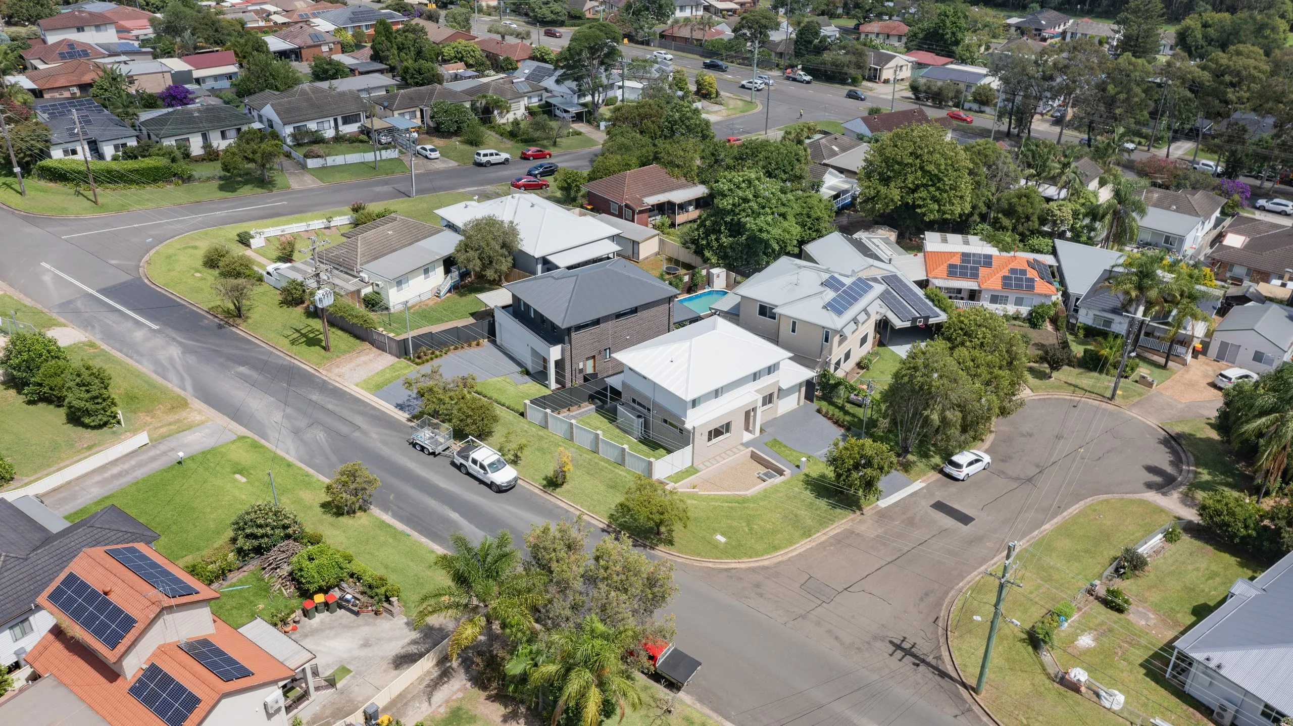 Aerial view of the subdivided block and both new homes in the Seven Hills streetscape
