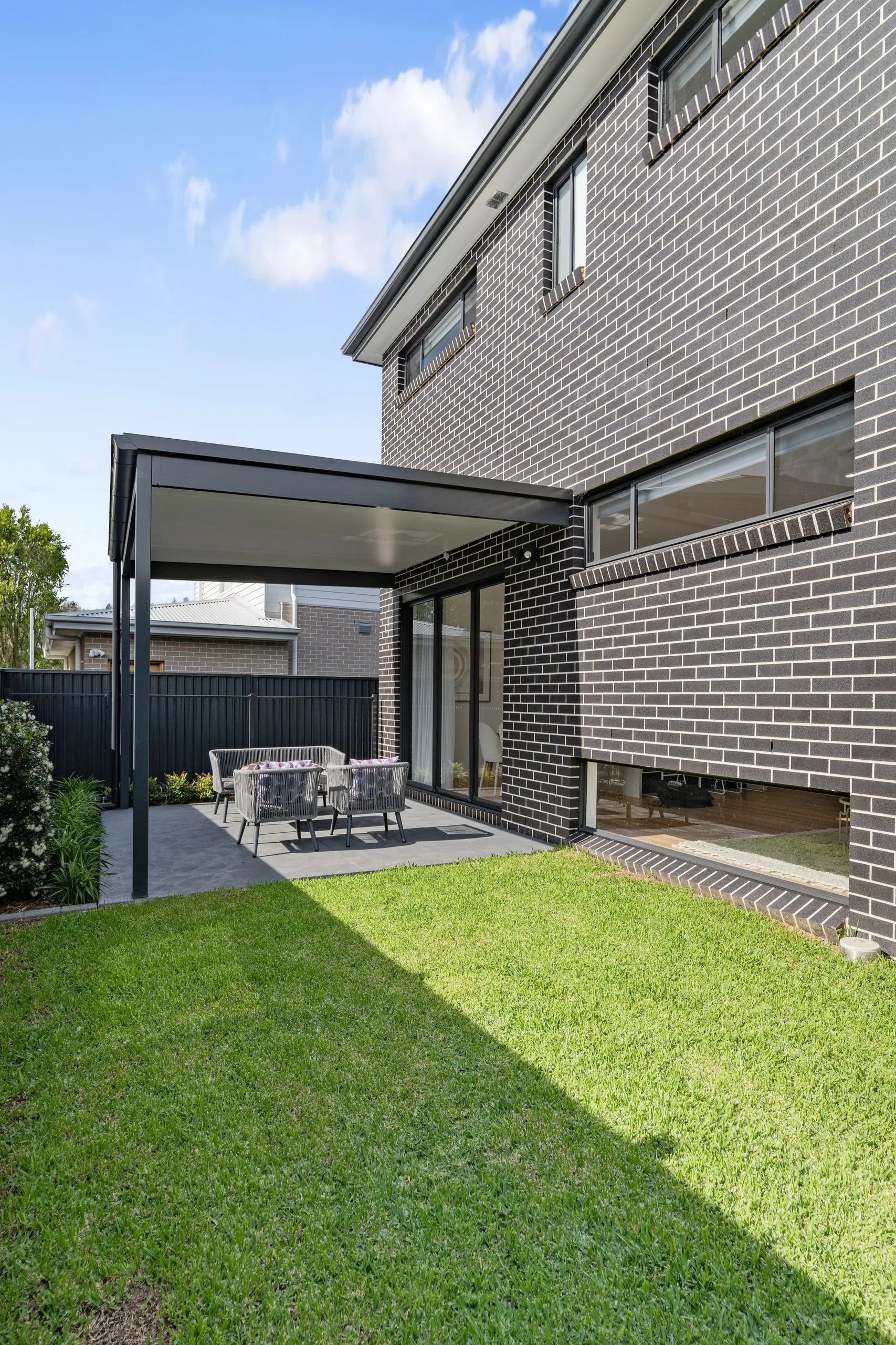 Covered alfresco and turfed yard behind the dual occupancy, Seven Hills