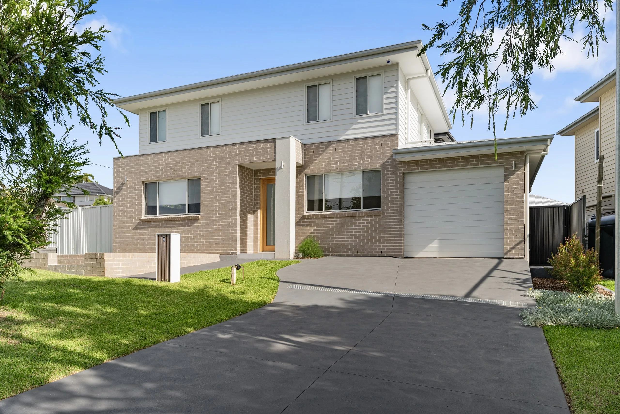 Second dual occupancy home with brick and weatherboard facade, Seven Hills