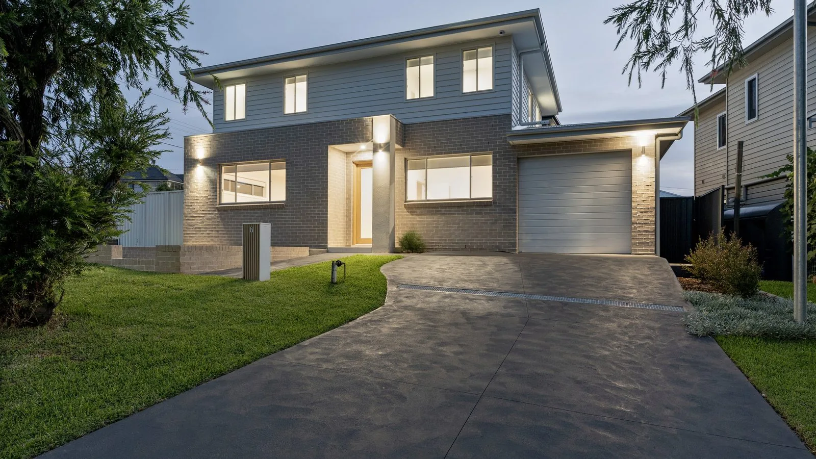 Dual occupancy home at dusk, built by Refined Group in Seven Hills