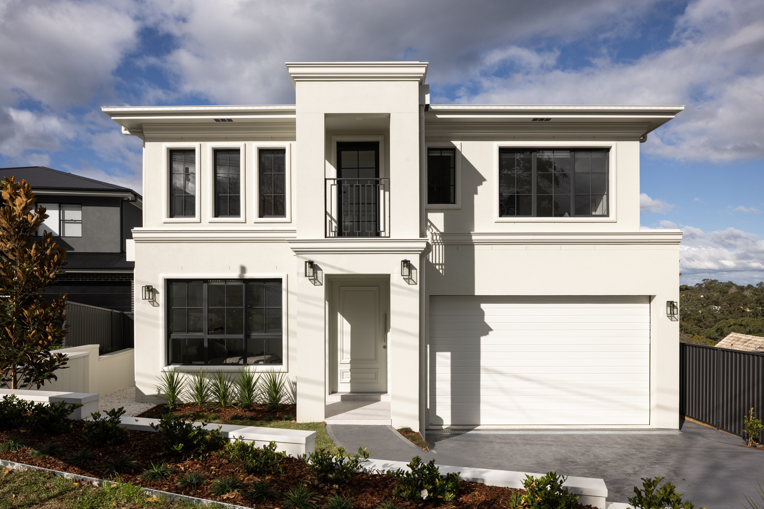 The Westleigh home in its street, blending with the neighbouring houses