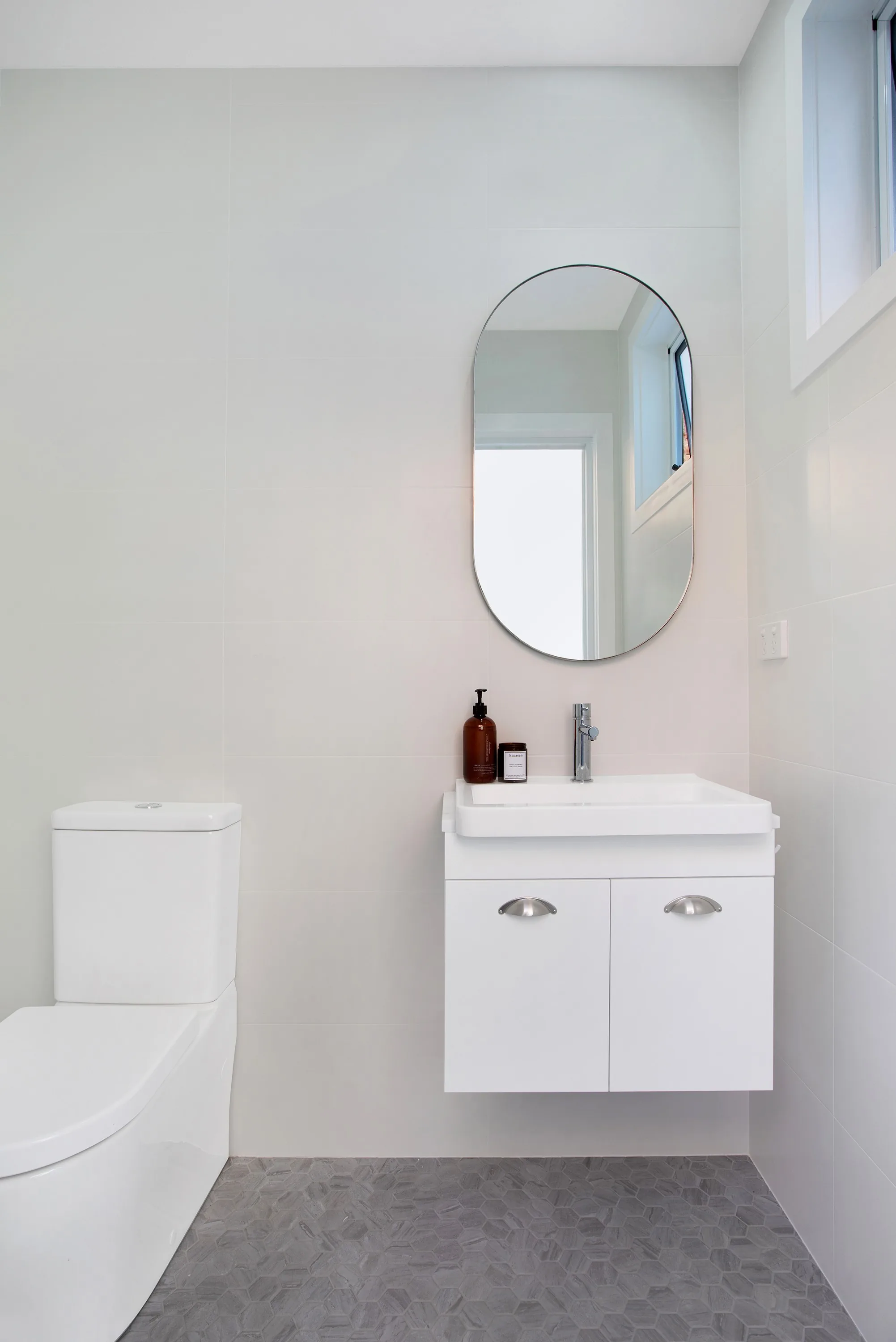 New outdoor bathroom, fully tiled with hexagonal mosaic floor, Willoughby project
