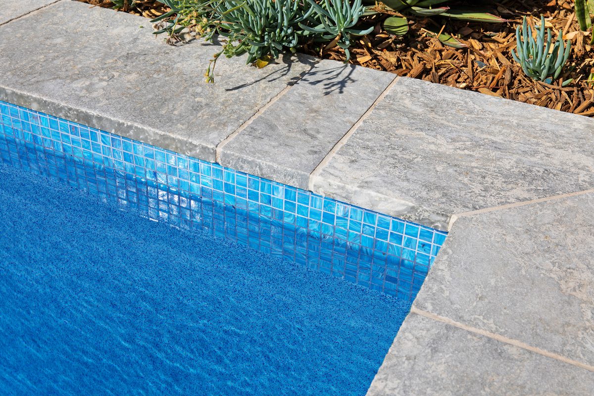 Waterline tile detail on a Refined Group concrete pool