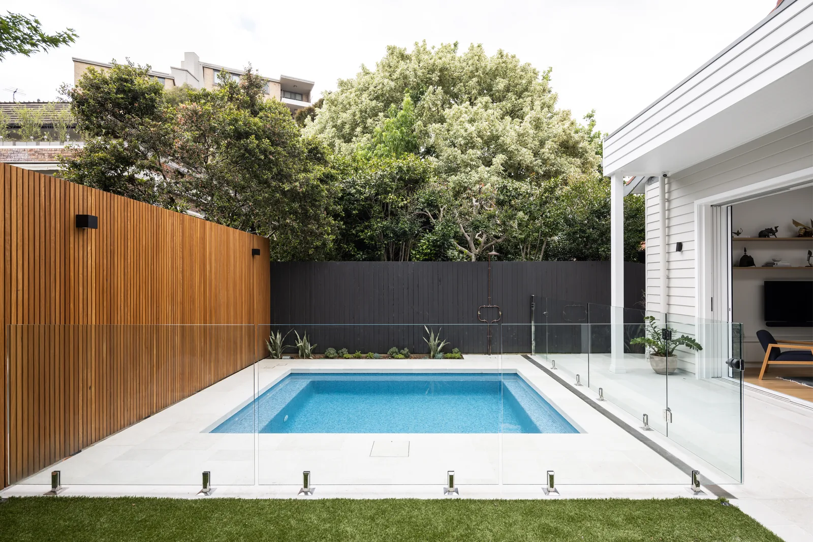 Fully tiled concrete pool and landscape in Mosman, built by Refined Group